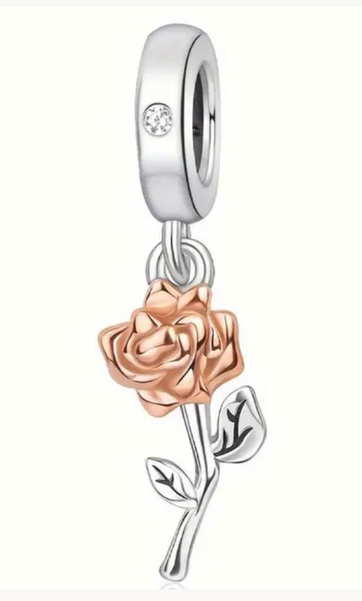 Rose charms and created opal charm! All solid sterling silver charms!