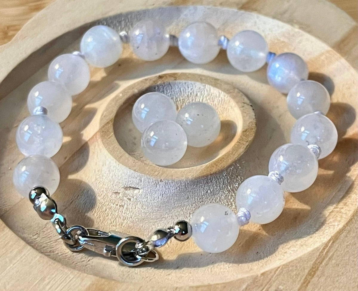 Glowing moonstone bracelet. High quality hand knotted 8mm moonstone bracelet with stainless steel or yellow gold plated stainless steel hardware!