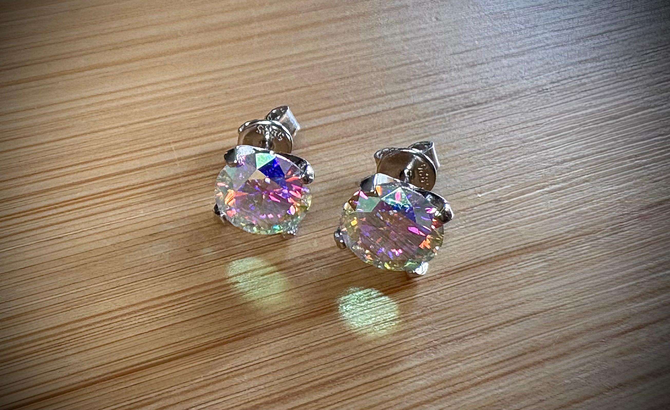 6ctw Moissanite “Kaleidoscope” studs! A pair of colorful, color-shifting, MESMERIZING Moissanite studs, DOUBLE certified and flashy in 18k plated sterling silver!