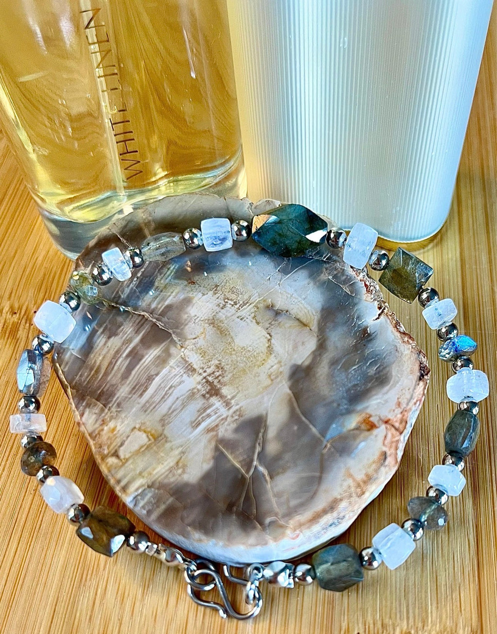 Labradorite and moonstone bracelet and/or earrings. The “Essences of Gemstones” bracelet with hand- faceted “essence” stones! This bracelet literally glows!