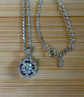Moissanite necklace. A certified 1ct Moissanite hibiscus necklace with white zircon accents in solid sterling and white rhodium!