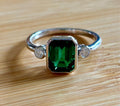 Emerald and Moissanite ring. A certified 2ct lab-grown emerald-cut Zambian emerald and .20cttw Moissanite ring! Exclusive to my shop!