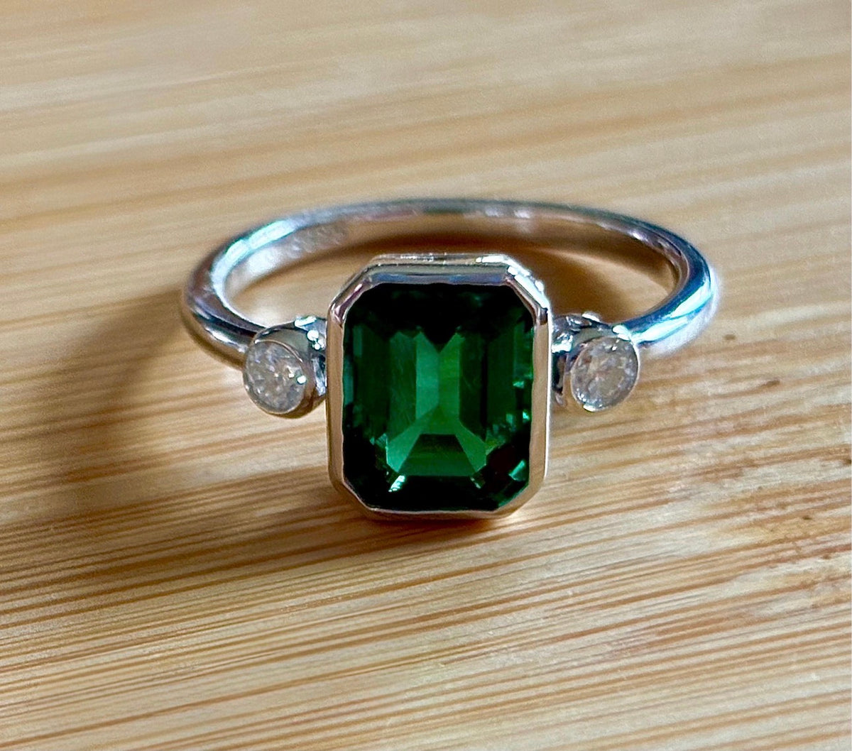Emerald and Moissanite ring. A certified 2ct lab-grown emerald-cut Zambian emerald and .20cttw Moissanite ring! Exclusive to my shop!