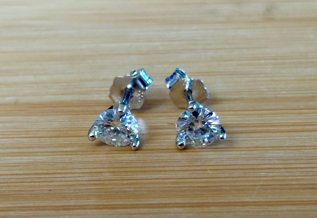 1ctw DOUBLE certified Moissanite studs, D-color and VVS1 clarity in delicate 3-claw settings! Minimalist design with substantial fire!