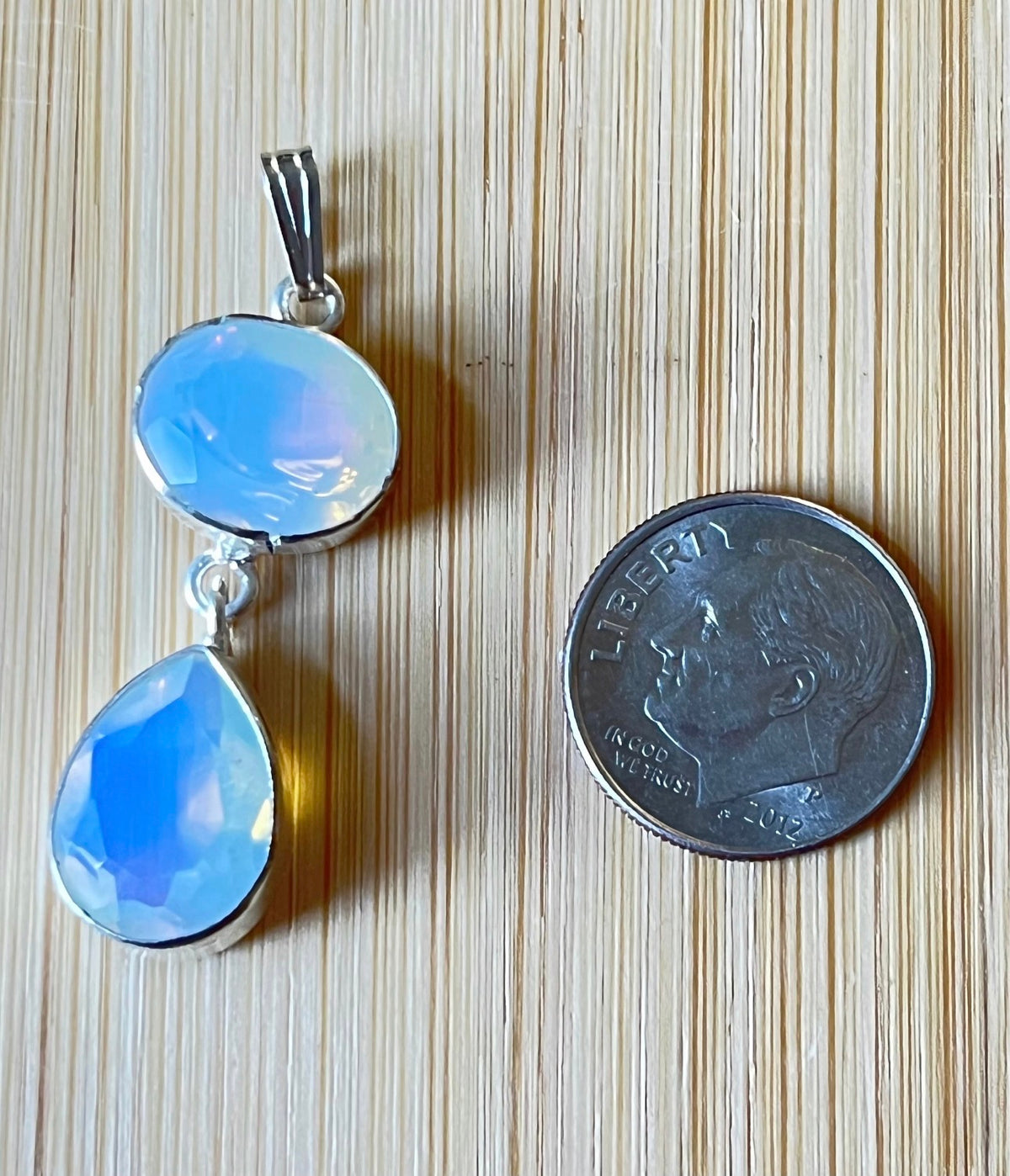 Rubellite tourmaline pendant, citrine pendant, London blue topaz pendant and manmade opal pendant. All solid sterling silver pendants!