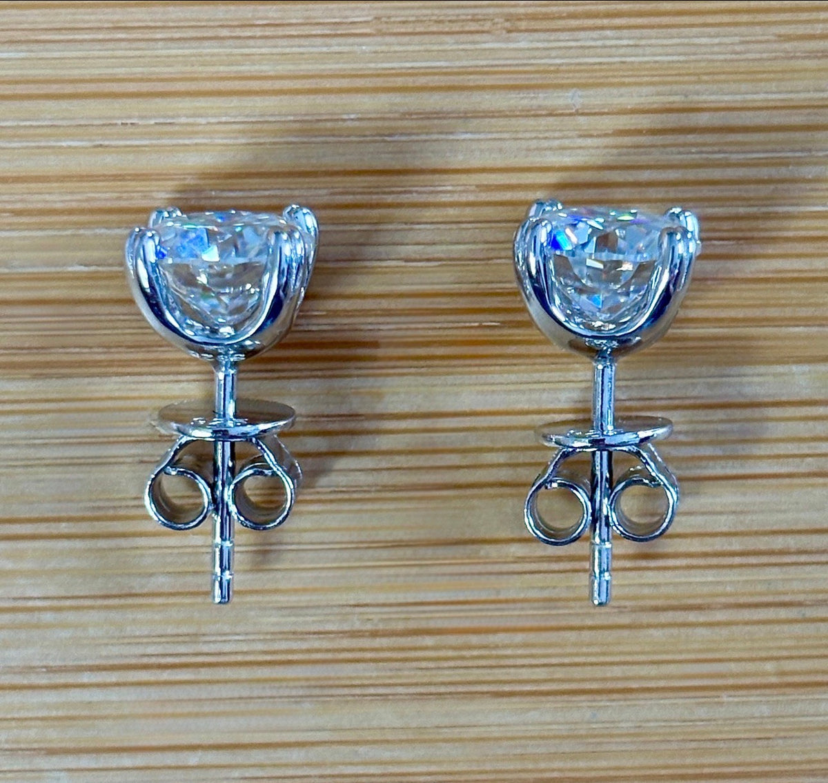 A lovely DOUBLE certified pair of 4cttw Old European Cut Moissanite studs in 935 Argentium silver and 18k double-claw mountings!