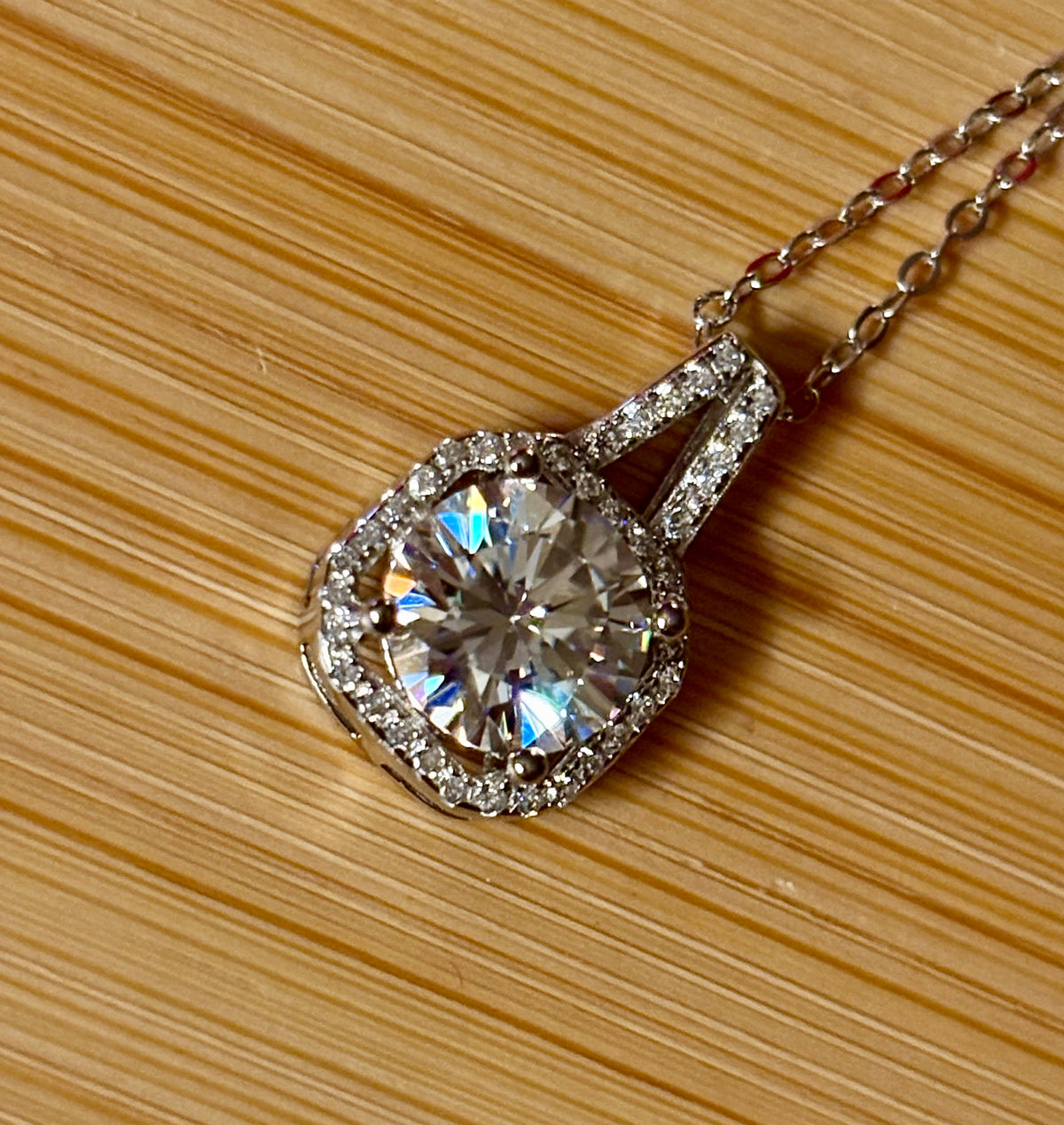 Moissanite necklace. A 2ct certified Moissanite set within an octagonally-shaped halo of pavé-set gleaming white zircons - at a 1ct price!