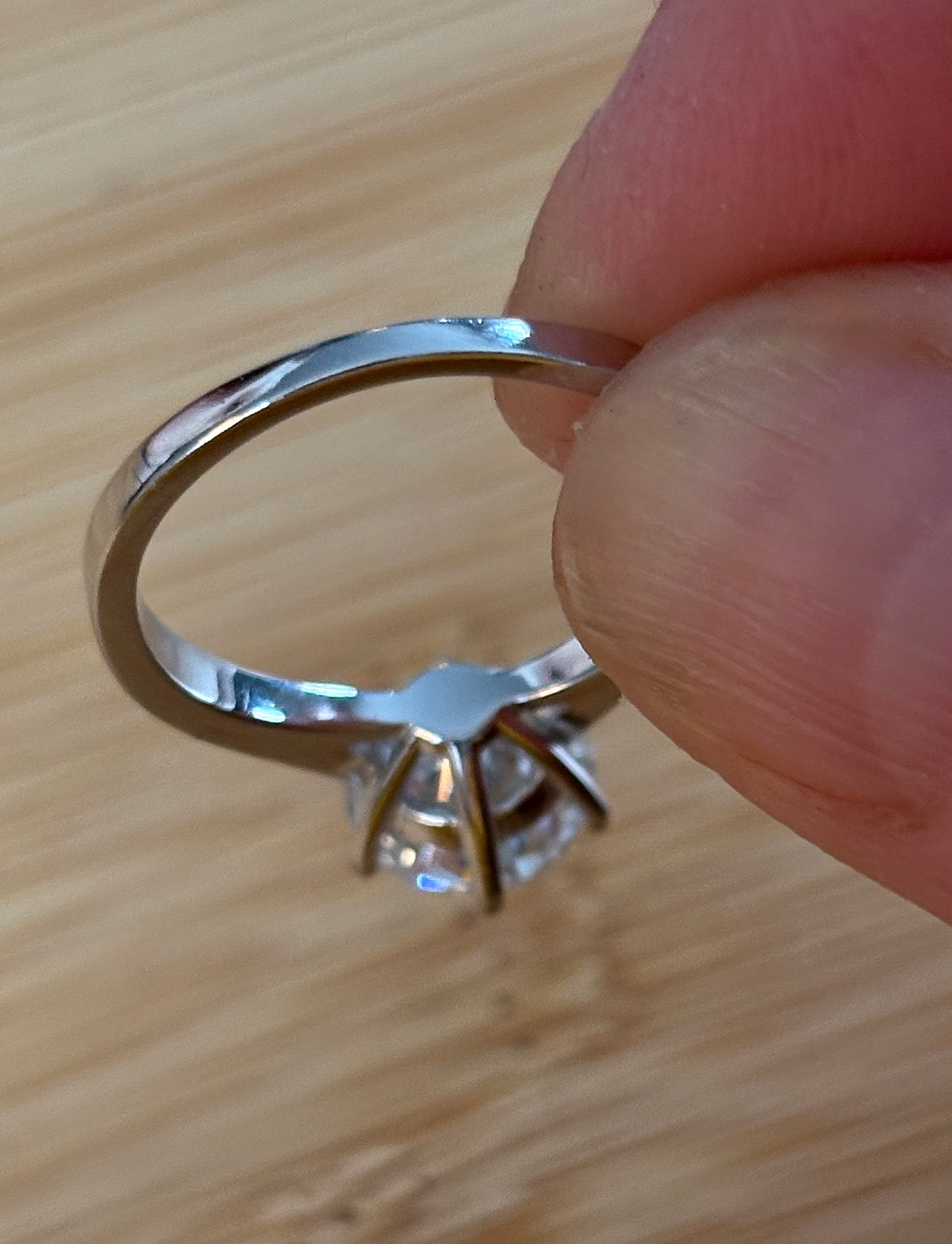 Moissanite ring. A delicious 3ct certified Moissanite solitaire with tapered shoulders and pavé-set white zircons in sterling and 18k gold!