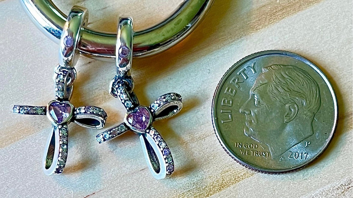 Paw print charms, dog lover charms, dog bone charms, turtle charm and cross charm! All solid sterling silver charms!