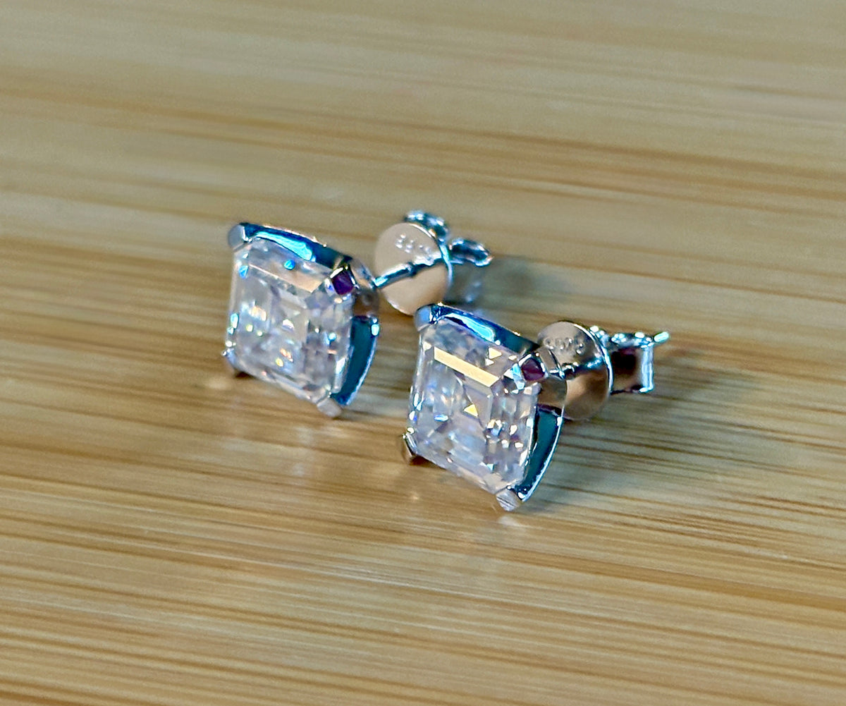 Moissanite studs. A 6.4ctw *perfect* pair of DOUBLE certified Asscher-cut Moissanites in my custom 4-claw 935 ARGENTIUM silver mountings! Opulent!