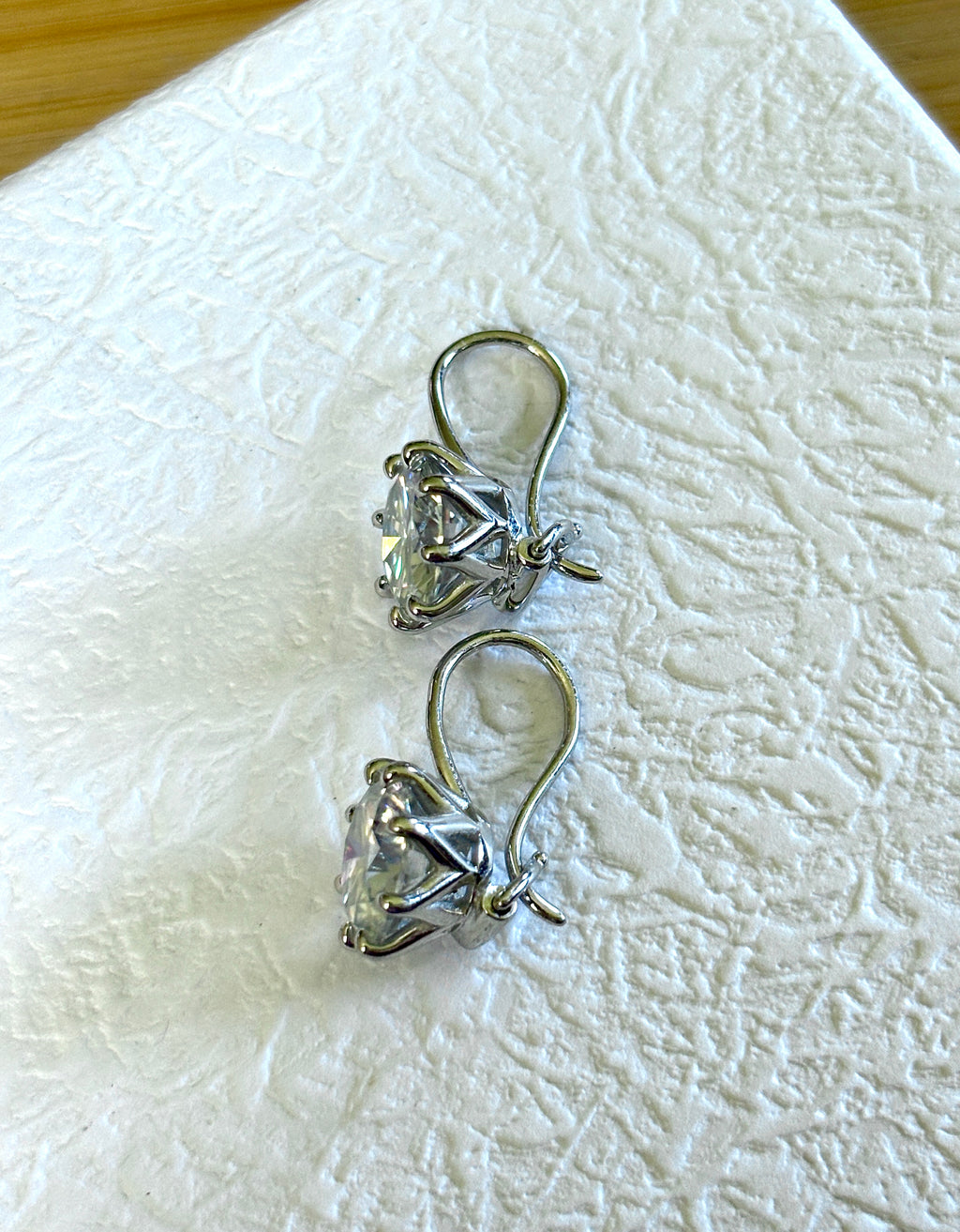 Moissanite earrings. Exclusive 8ctw double certified Moissanite fish hook earrings with *buckle backs* in 935 Argentium silver and 18k white rhodium!