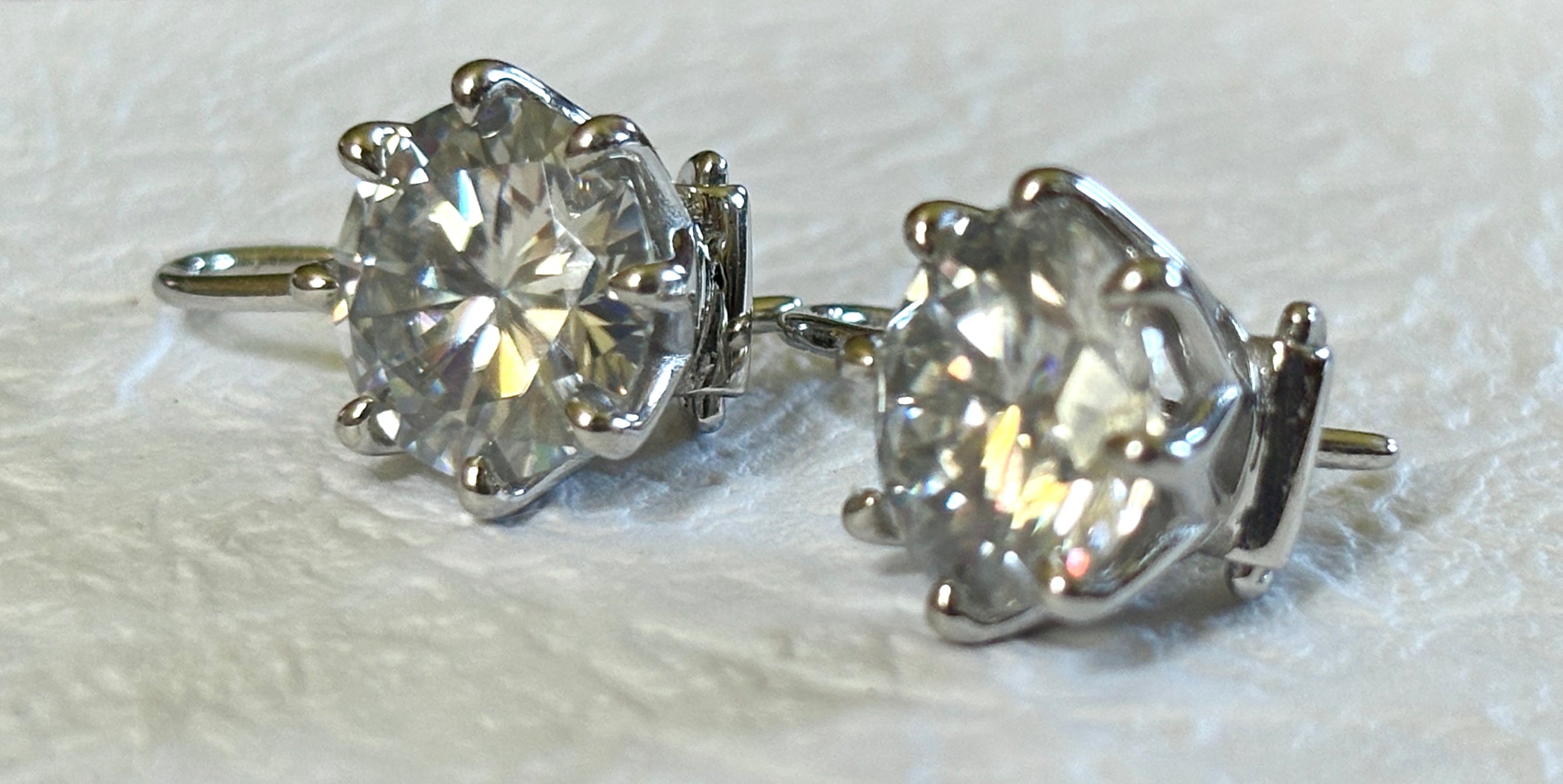 Moissanite earrings. Exclusive 8ctw double certified Moissanite fish hook earrings with *buckle backs* in 935 Argentium silver and 18k white rhodium!