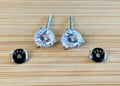 Moissanite studs. A 100-facet 2cttw pair of super bright, DOUBLE certified Moissanite studs in sterling silver and 18k white rhodium! Sublime!
