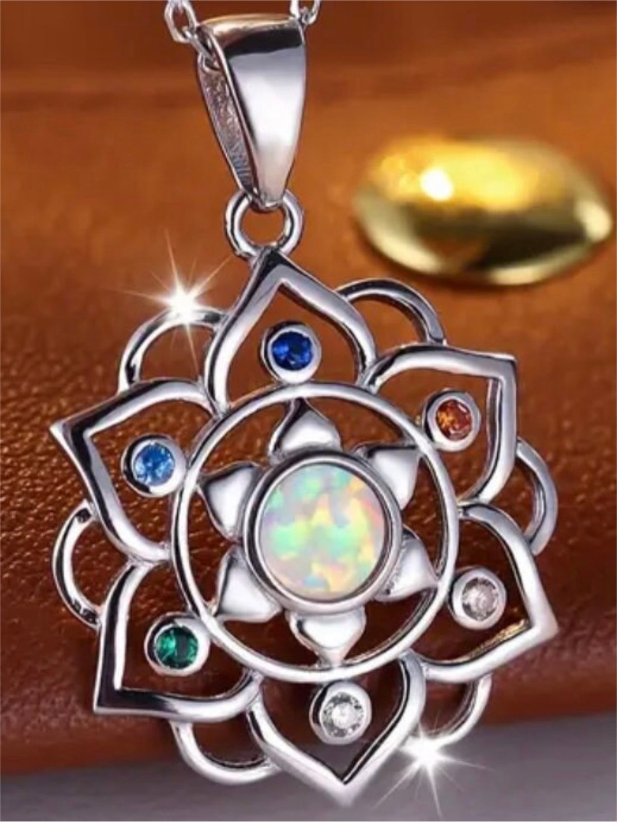 Opalescent lotus flower necklace, dream catcher earrings and dream catcher charm! All solid sterling silver and accented with pretty gems!