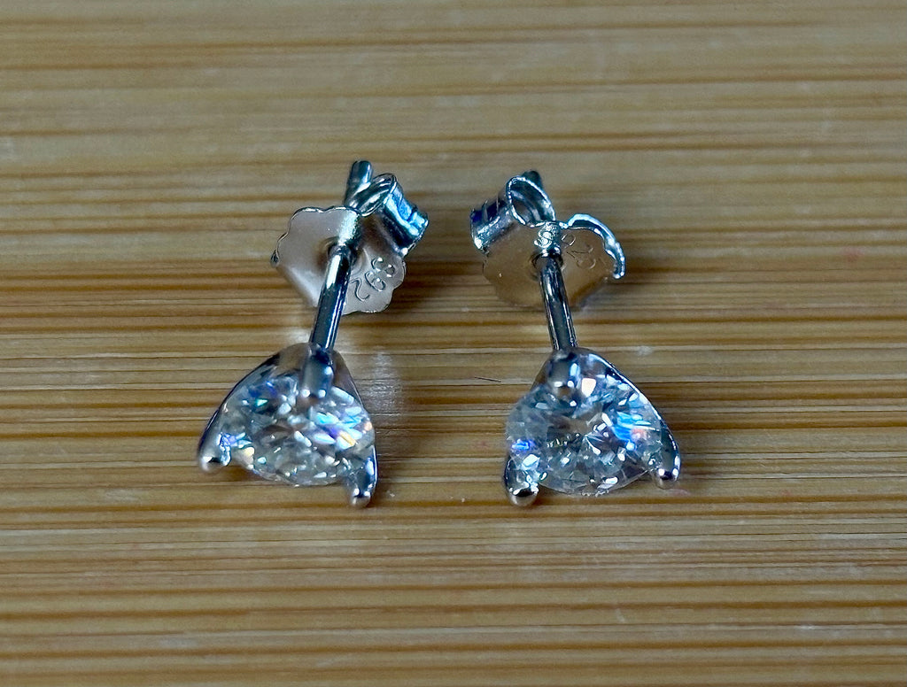1ctw DOUBLE certified Moissanite studs, D-color and VVS1 clarity in delicate 3-claw settings! Minimalist design with substantial fire!
