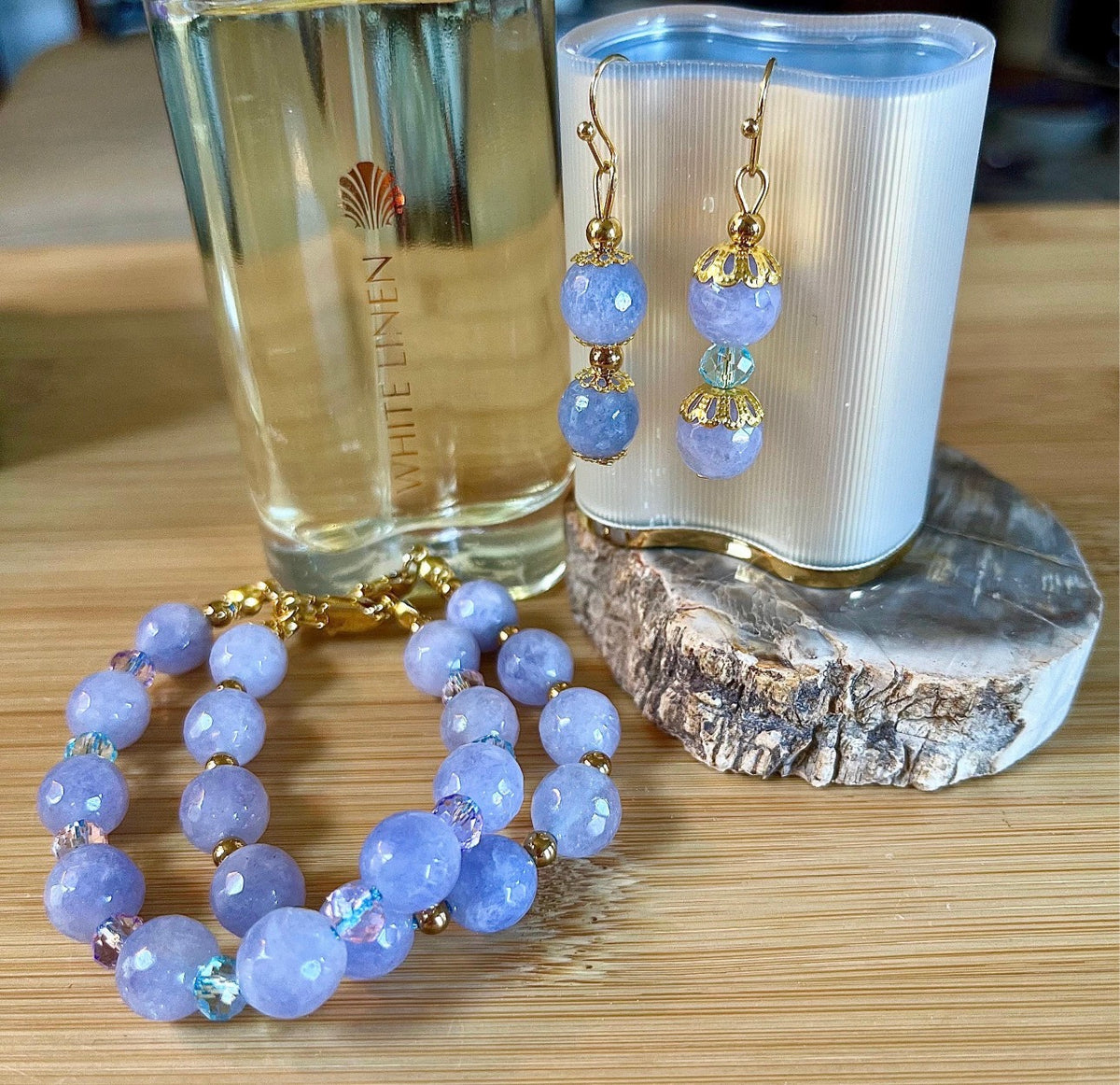 Aquamarine bracelets and/or earrings. Faceted 10mm aquamarines with your choice of crystal or stainless steel station beads and stainless steel color!