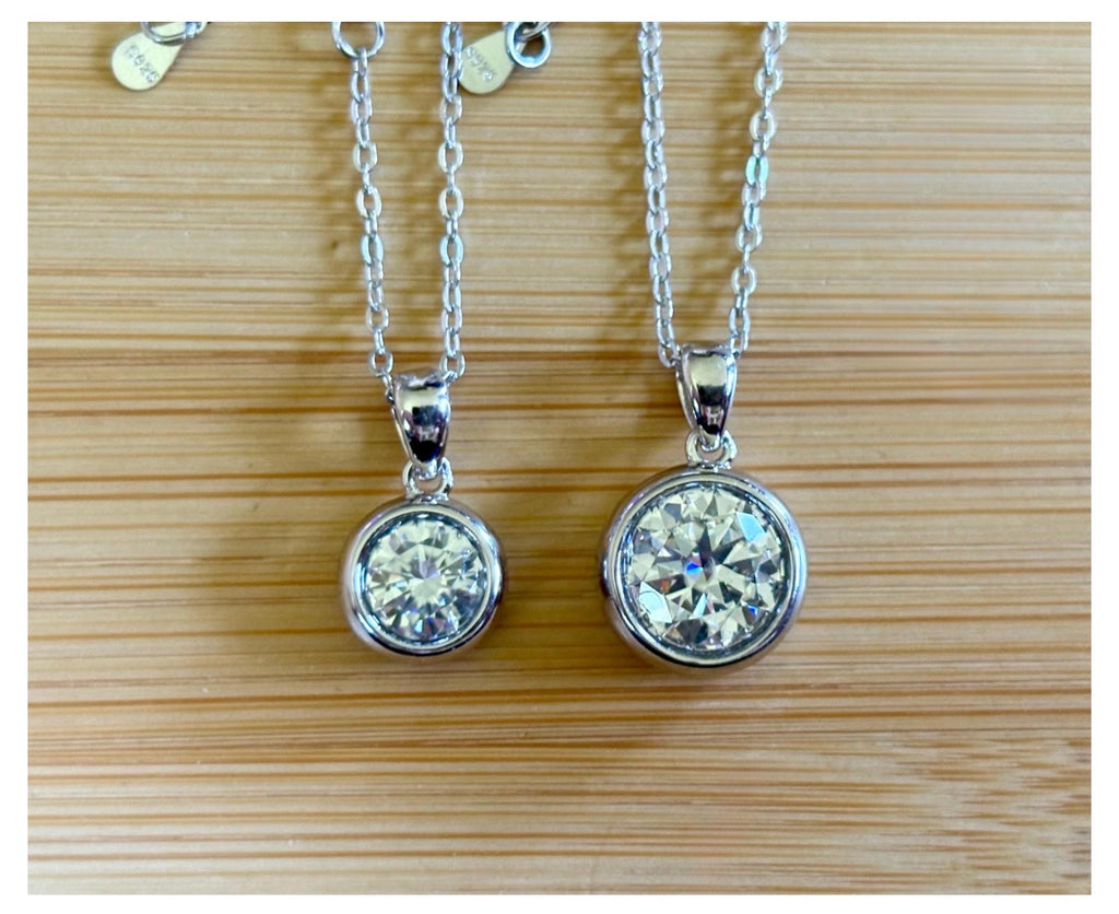 Moissanite necklace. My fiery “bubble bezel” necklace features a 1ct OR 3ct certified Moissanite in a heavy sterling silver bezel setting!