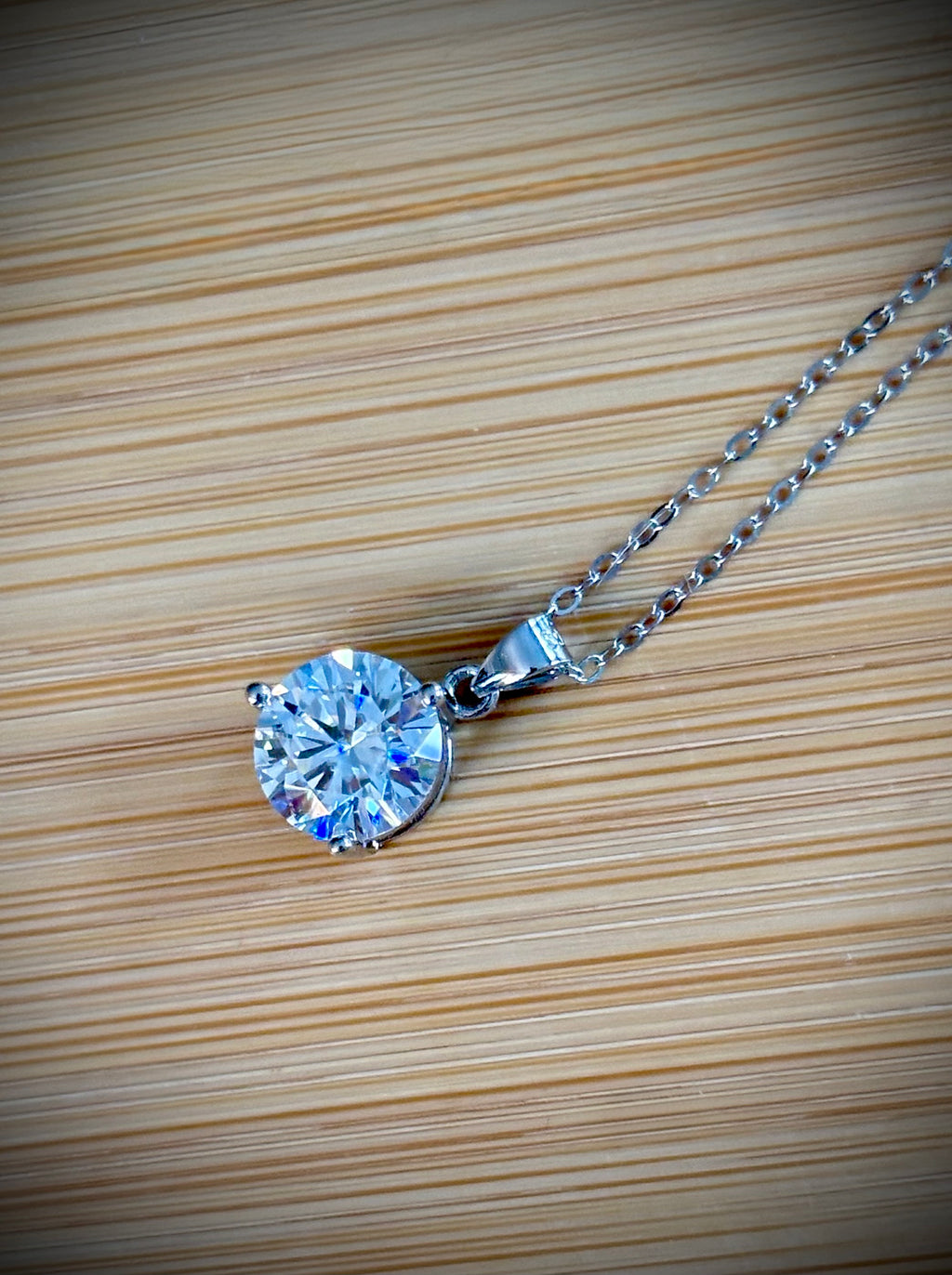 Moissanite necklace. A bright, white 3ct Moissanite solitaire in a minimalist sterling silver 3-prong mounting! Just gorgeous!