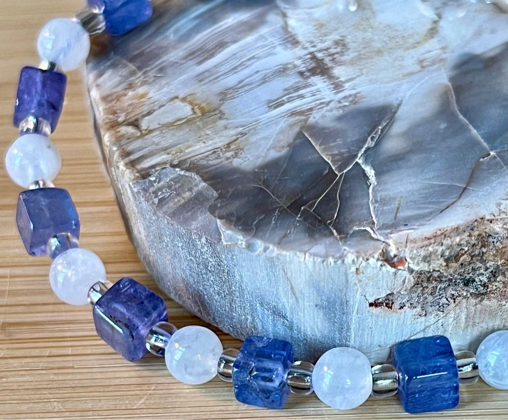 Moonstone and tanzanite bracelet. Dusky tanzanite cubes and round moonstones on stainless steel jeweler’s wire! Pretty and petite!