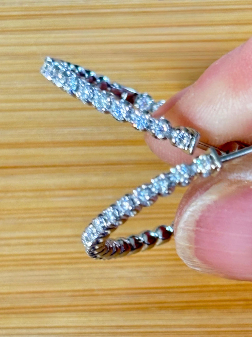 Moissanite hoops. These 1.8ctw Moissanite inside-out hoops *lock* in place so you can take your style from the office to the dance floor! So boogie down!