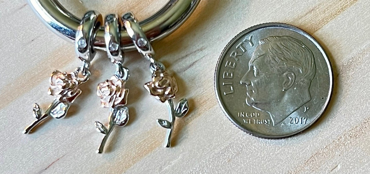 Rose charms and created opal charm! All solid sterling silver charms!