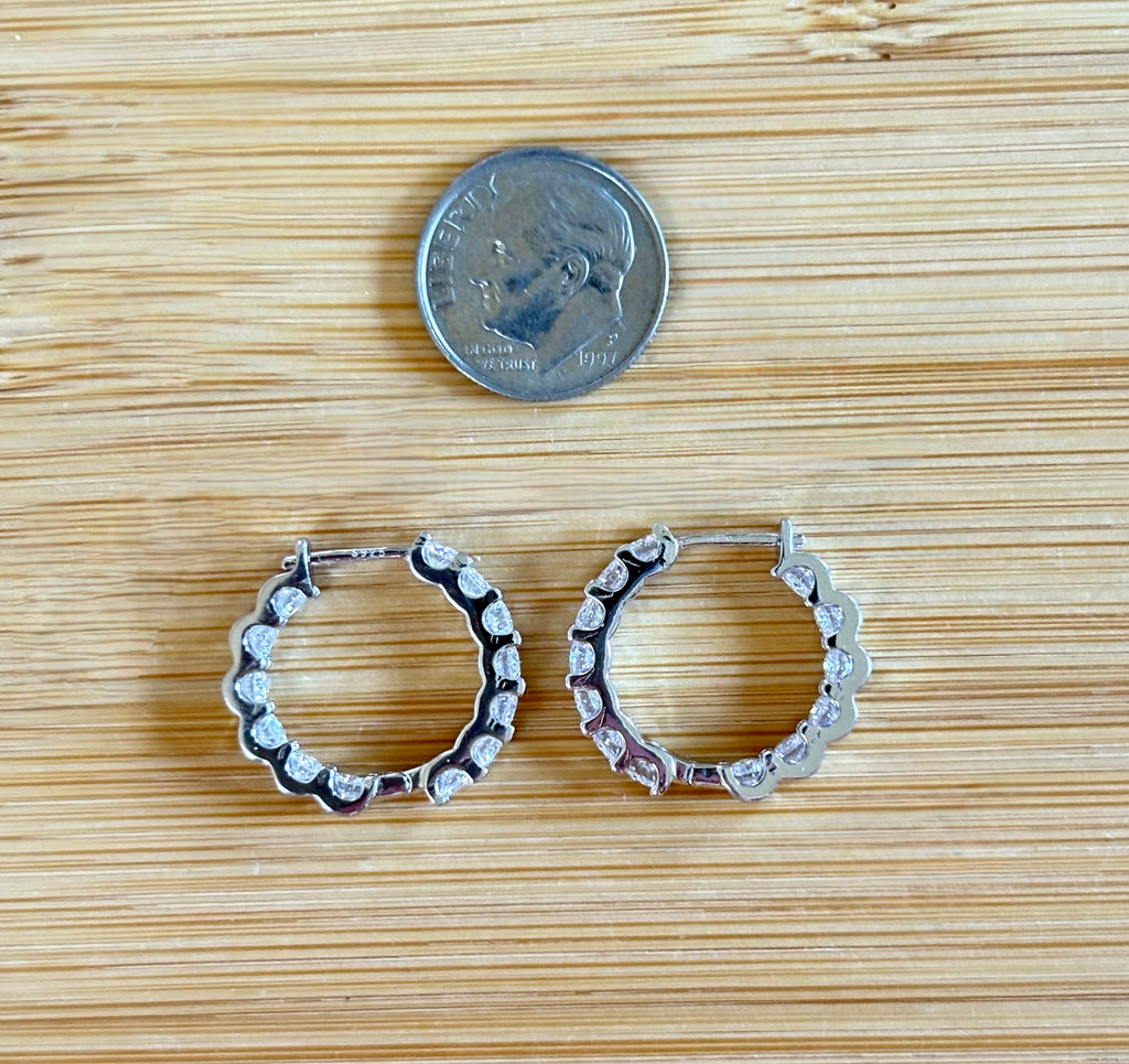 Moissanite hoops. A certified 2.6cttw pair of flashy Moissanite hoops - just like porridge, not too big and not too small, but *just right*!