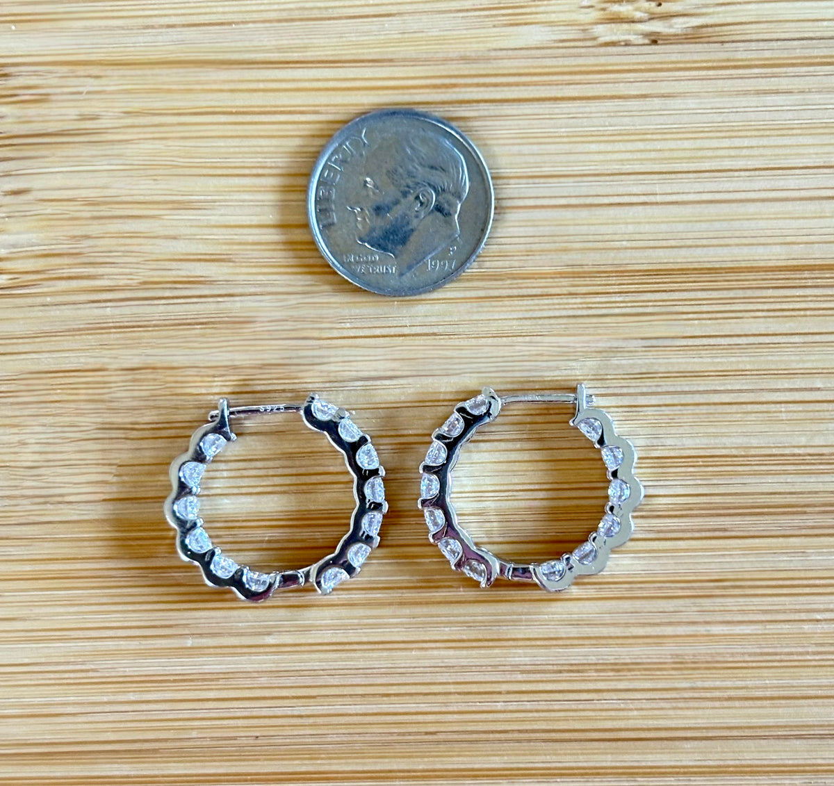 Moissanite hoops. A certified 2.6cttw pair of flashy Moissanite hoops - just like porridge, not too big and not too small, but *just right*!