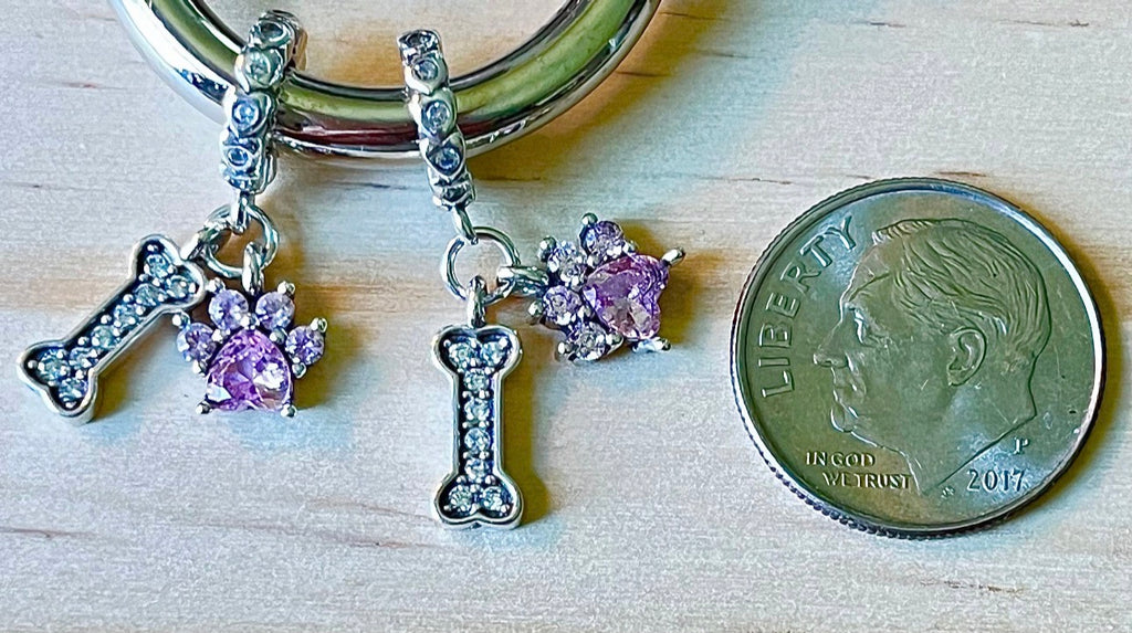 Paw print charms, dog lover charms, dog bone charms, turtle charm and cross charm! All solid sterling silver charms!