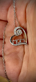 Moissanite necklace. A certified 1/2ct round radiant Moissanite in a pendant just for your mom or because you’re a mom, in sterling silver with zircon accents!