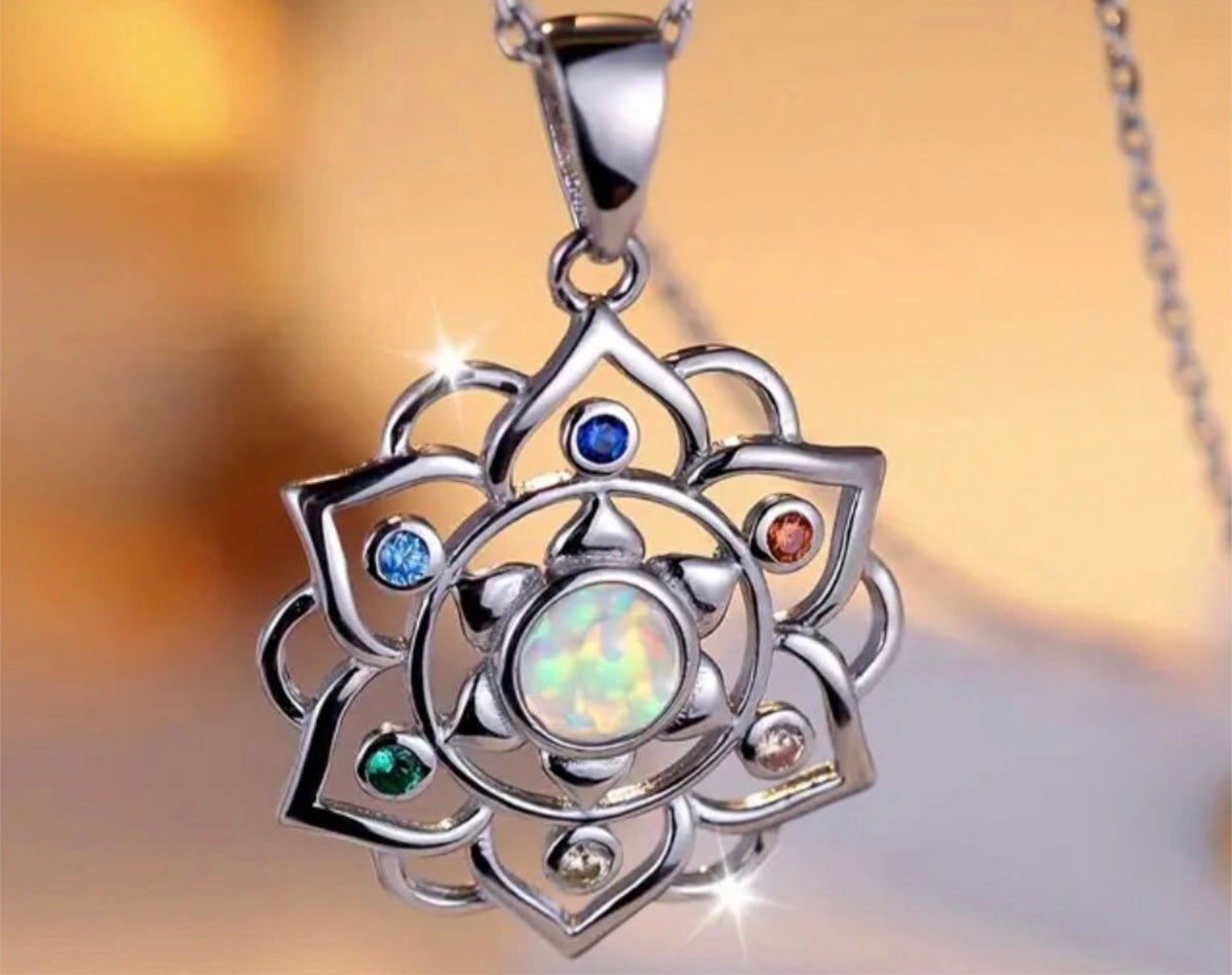 Opalescent lotus flower necklace, dream catcher earrings and dream catcher charm! All solid sterling silver and accented with pretty gems!