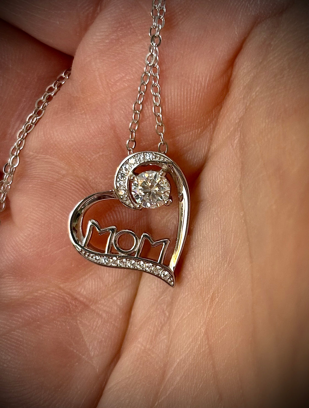 Moissanite necklace. A certified 1/2ct round radiant Moissanite in a pendant just for your mom or because you’re a mom, in sterling silver with zircon accents!