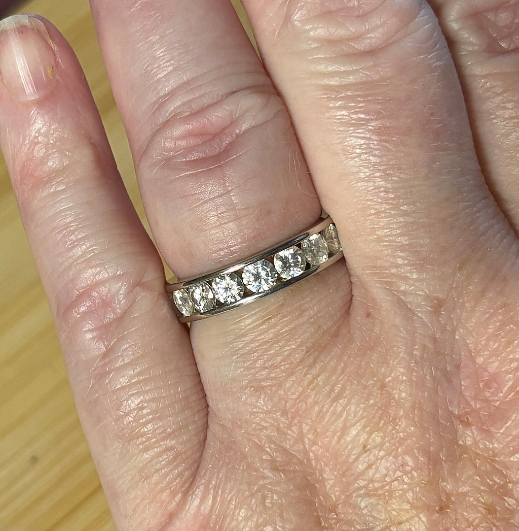 Moissanite ring. A 5.10cttw or 4.8cttw (depending on size) Moissanite eternity ring. A channel-set, classy and classic design - beautiful!