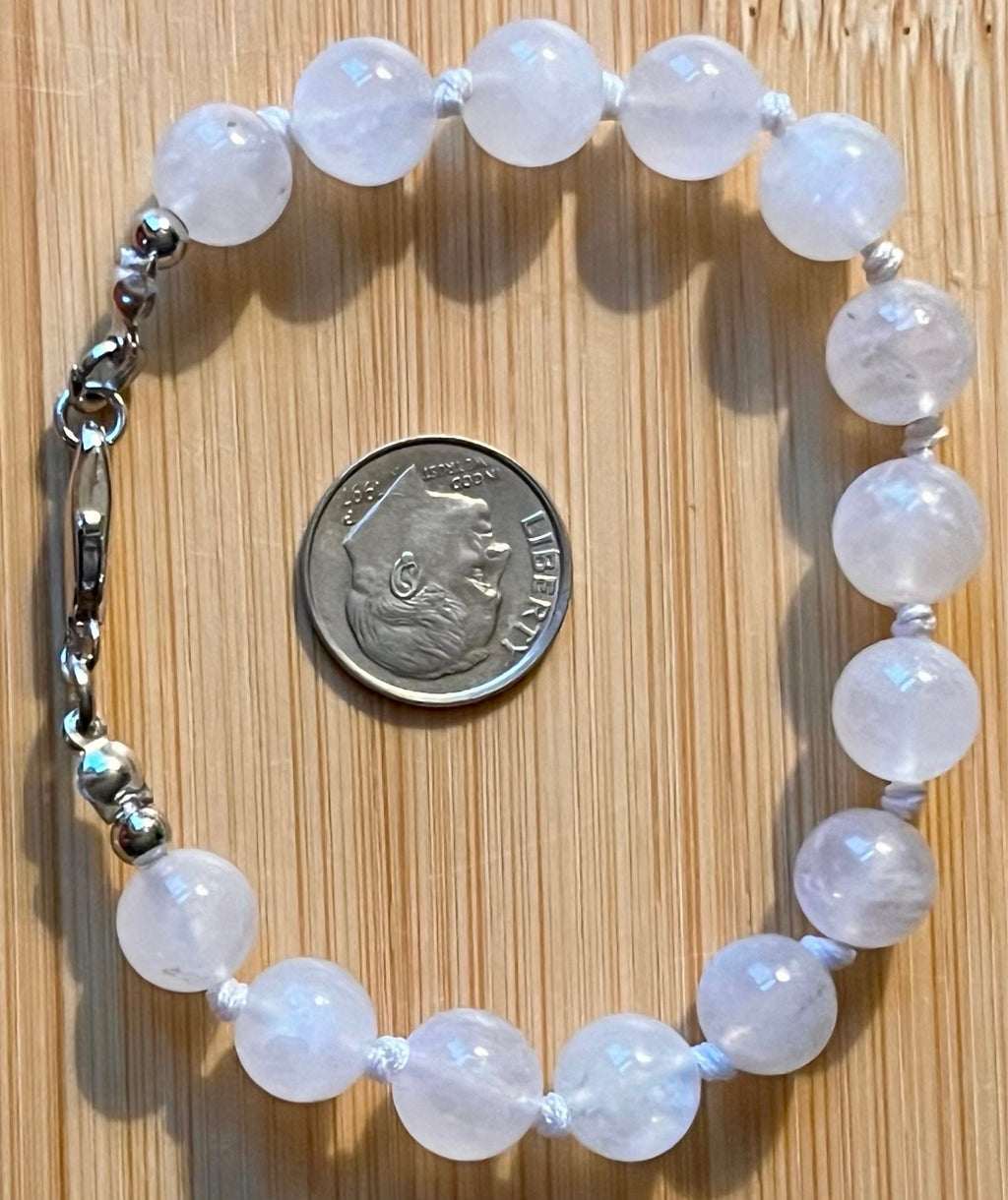 Glowing moonstone bracelet. High quality hand knotted 8mm moonstone bracelet with stainless steel or yellow gold plated stainless steel hardware!