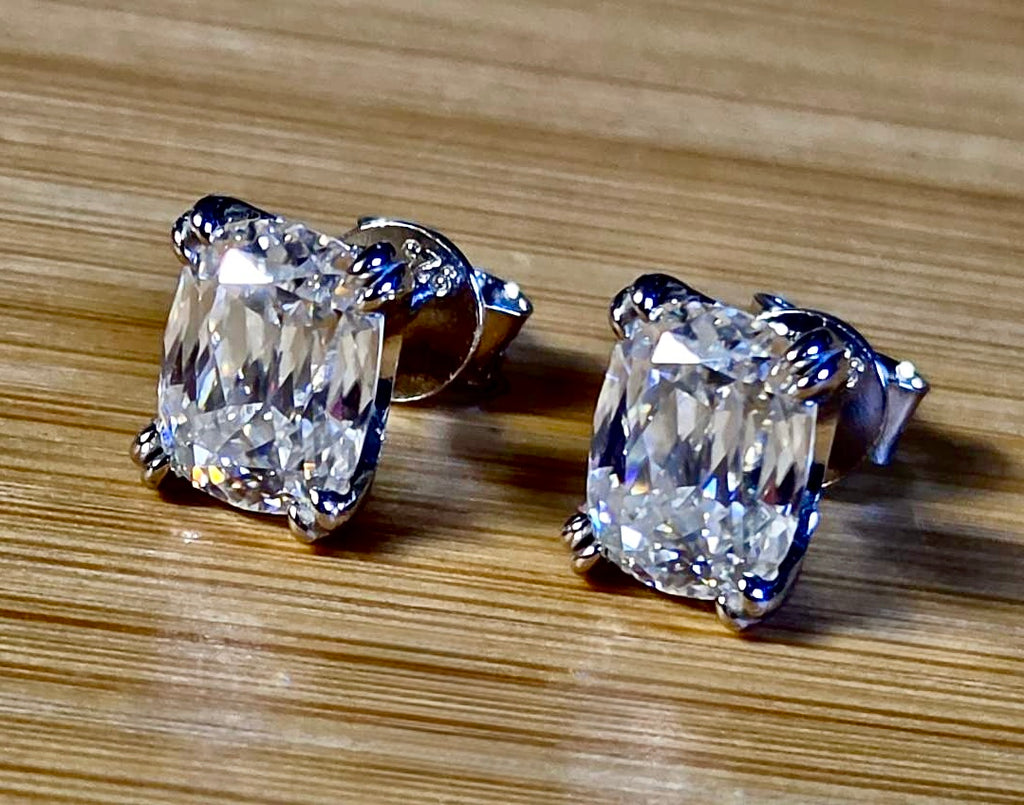 6ctw Ashoka-cut Moissanites in Argentium silver, hand-cut by a Master lapidary! These studs are the highest of the high end!
