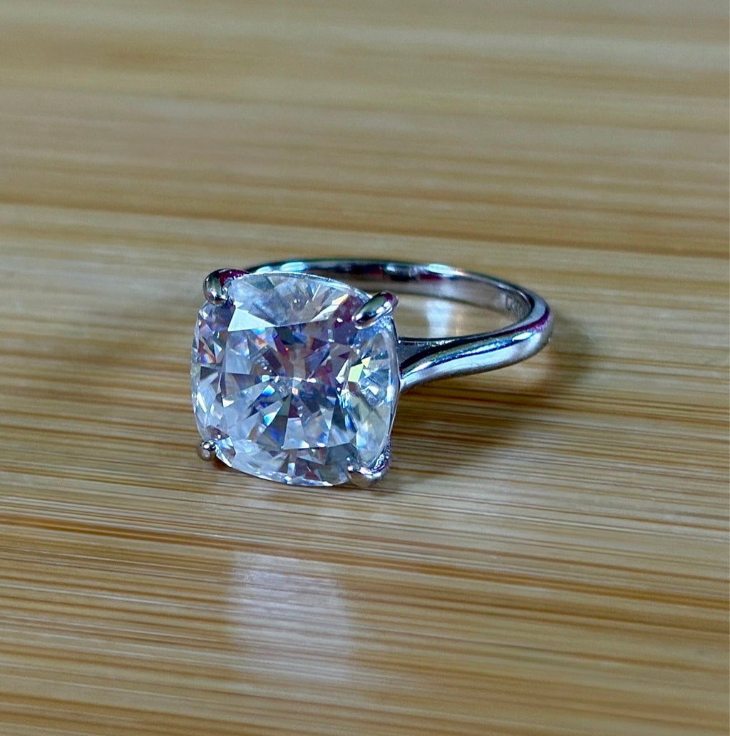 Moissanite ring. A 9ct certified cushion-cut *crushed ice* faceted Moissanite solitaire statement ring. Did someone order extra sparkles?!