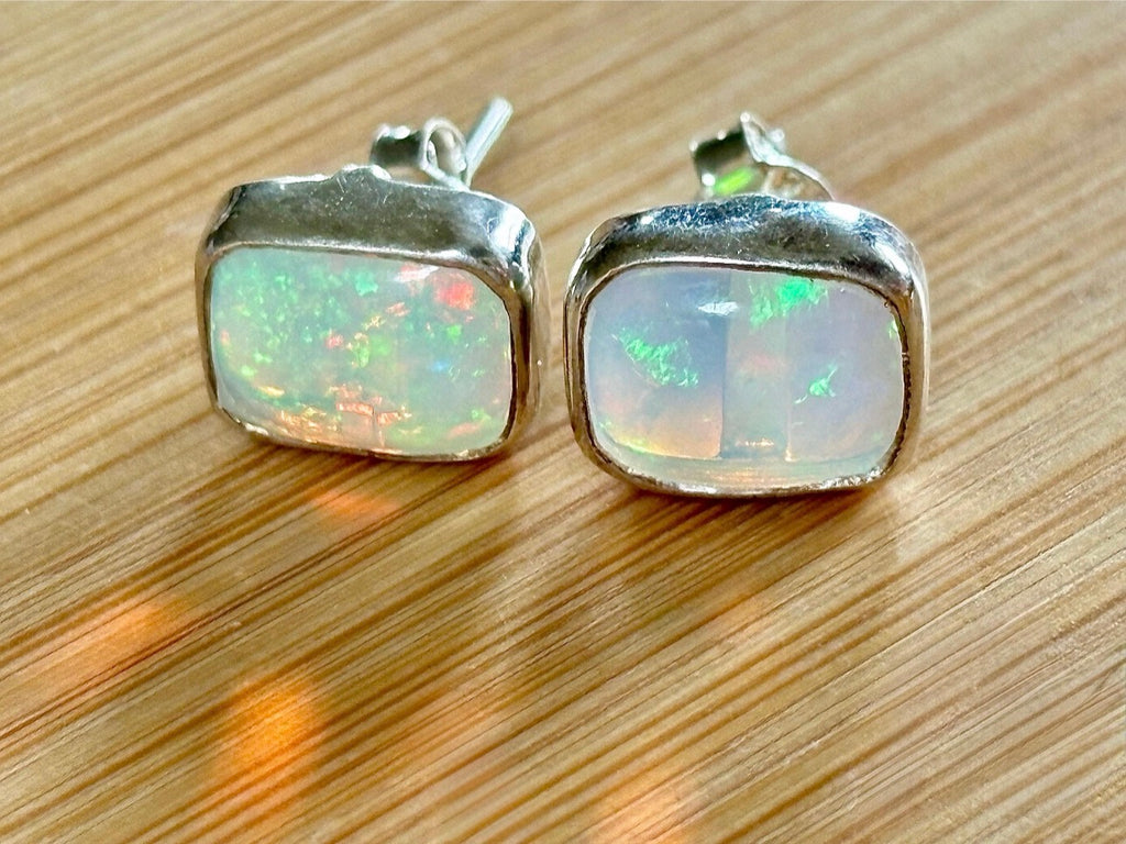 Ethiopian opal earrings, pair B. A beautiful pair of rectangular Ethiopian opal earrings, approximately 4cttw and hand-set in sterling silver bezels!