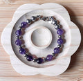 Amethyst bracelet. Pretty purple amethysts with chevron pattern crystallization! 8mm beads with durable stainless steel bracelet hardware!