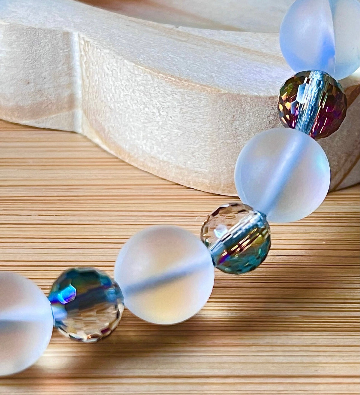 Austrian crystal bracelet with your choice of 6mm or 10mm frosted crystal beads, with golden or silvery stainless steel hardware.
