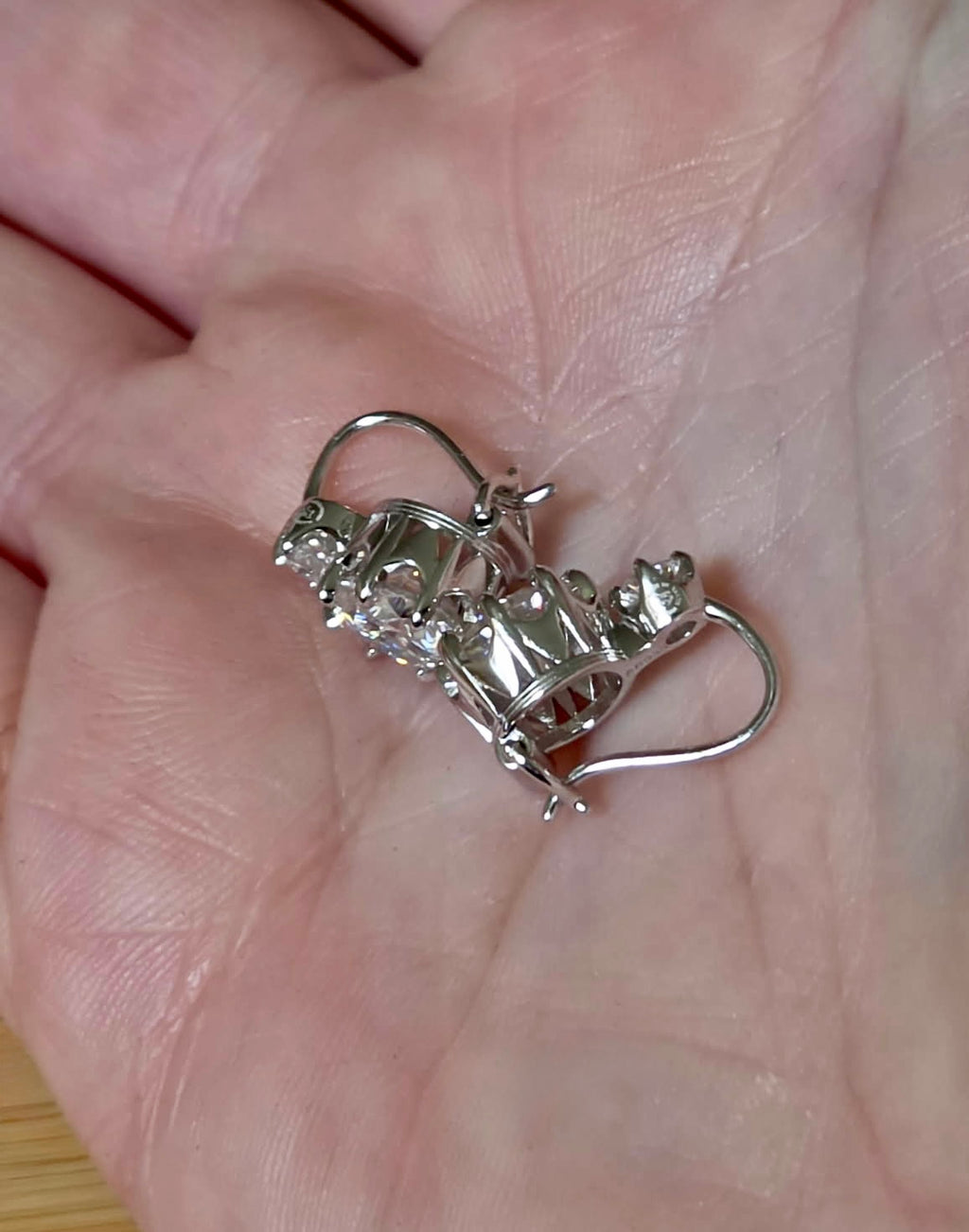 A Victorian inspired 4.2cttw certified pair of Moissanite 2-stone buckle back earrings in Argentium silver! Minimalist glam!
