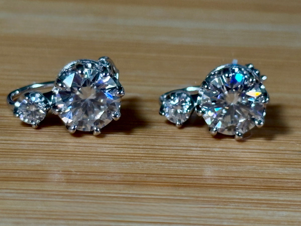 A Victorian inspired 4.2cttw certified pair of Moissanite 2-stone buckle back earrings in Argentium silver! Minimalist glam!