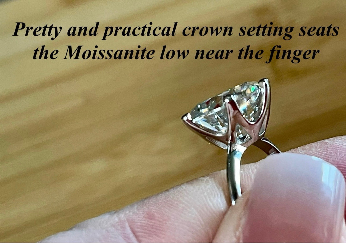Moissanite ring. A gorgeous 10ct certified round brilliant Moissanite in a lovely crown setting, with 6 prongs and a sleek plain band!