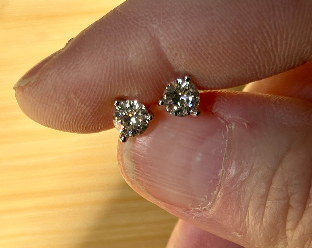 1ctw DOUBLE certified Moissanite studs, D-color and VVS1 clarity in delicate 3-claw settings! Minimalist design with substantial fire!