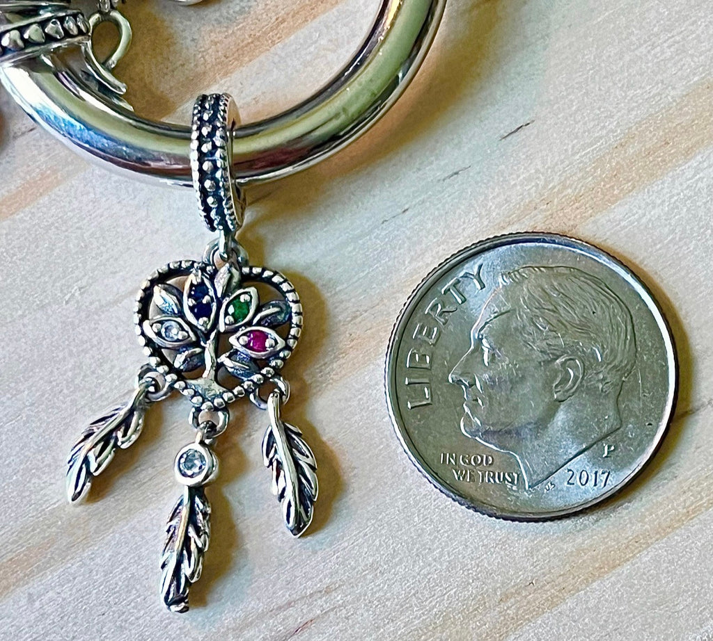 Opalescent lotus flower necklace, dream catcher earrings and dream catcher charm! All solid sterling silver and accented with pretty gems!