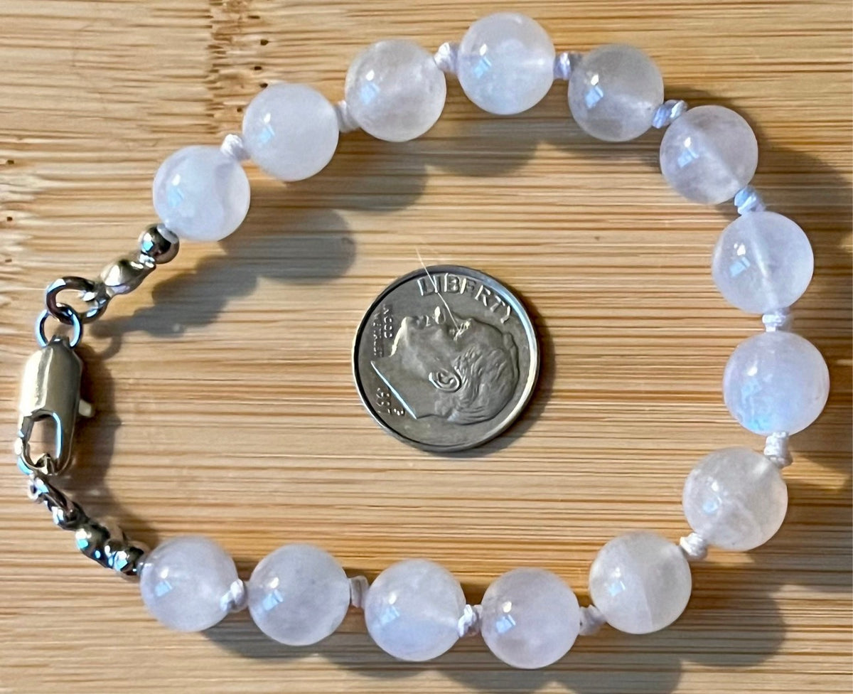 Glowing moonstone bracelet. High quality hand knotted 8mm moonstone bracelet with stainless steel or yellow gold plated stainless steel hardware!