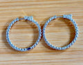 Moissanite hoops. These 1.8ctw Moissanite inside-out hoops *lock* in place so you can take your style from the office to the dance floor! So boogie down!