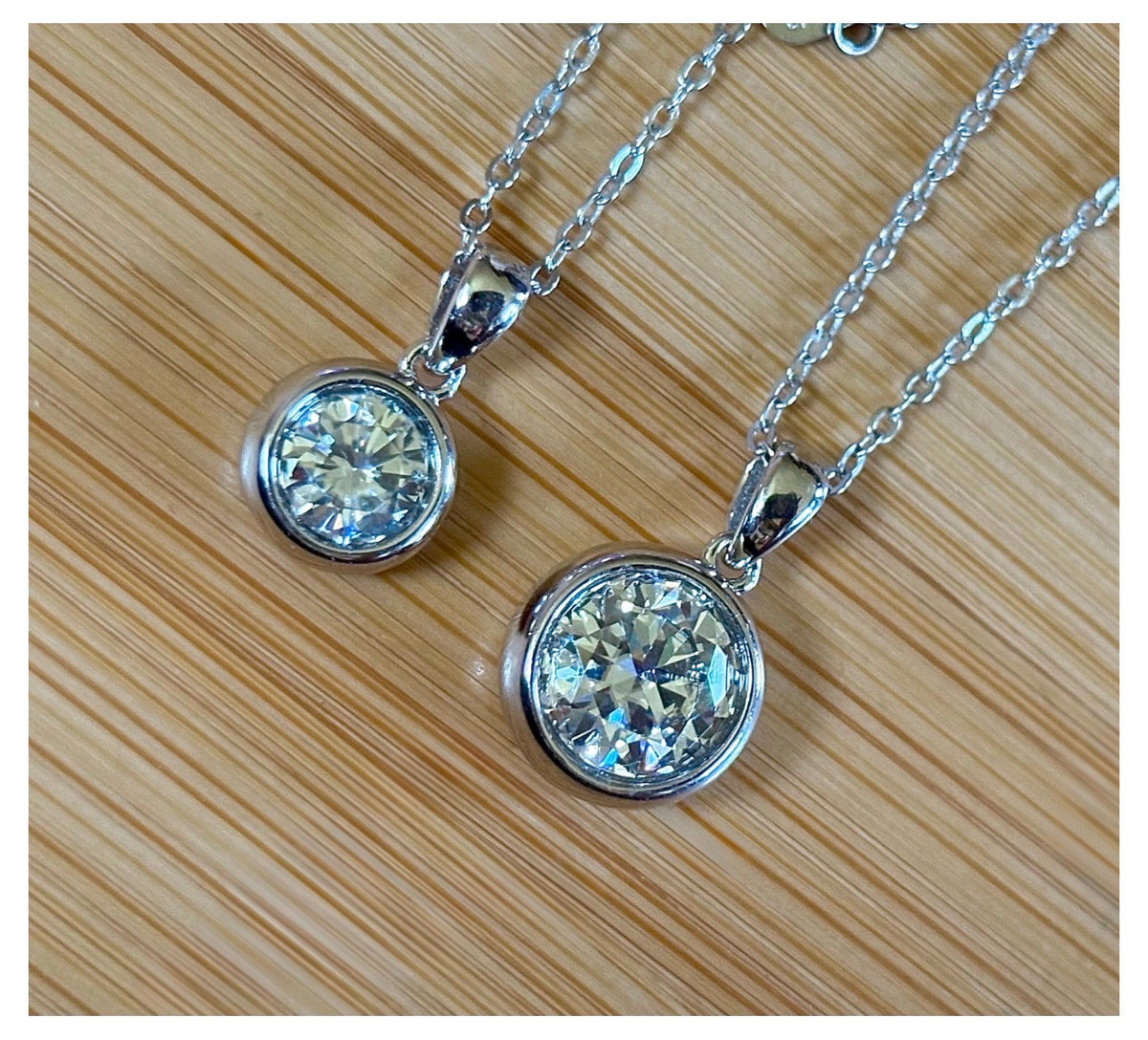Moissanite necklace. My fiery “bubble bezel” necklace features a 1ct OR 3ct certified Moissanite in a heavy sterling silver bezel setting!