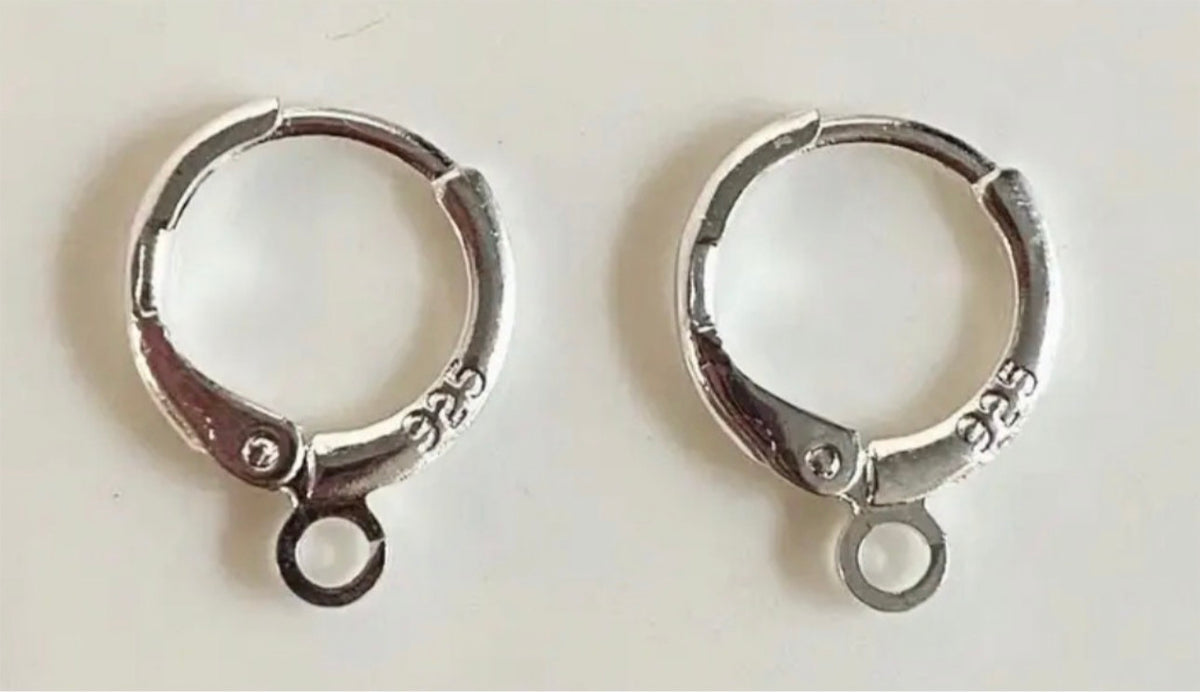 Sterling silver double lobster claw clasps, stainless steel charm keepers, 925 earring rings/charm holders and other miscellaneous jewelry items.