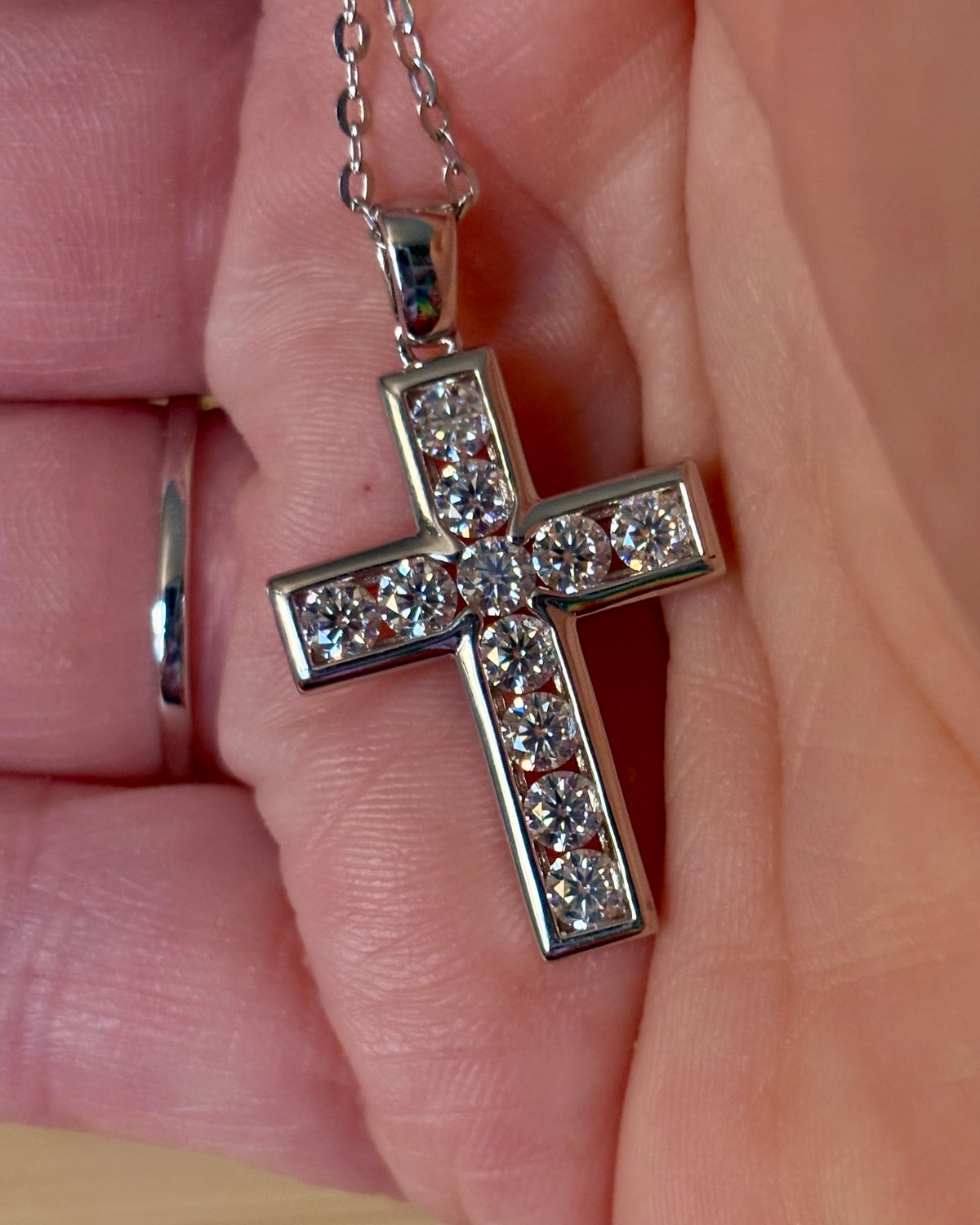 Moissanite necklace. A beautiful 2.2cttw certified Moissanite cross with channel-style stone setting. Classy, elegant, contemporary and très chic!