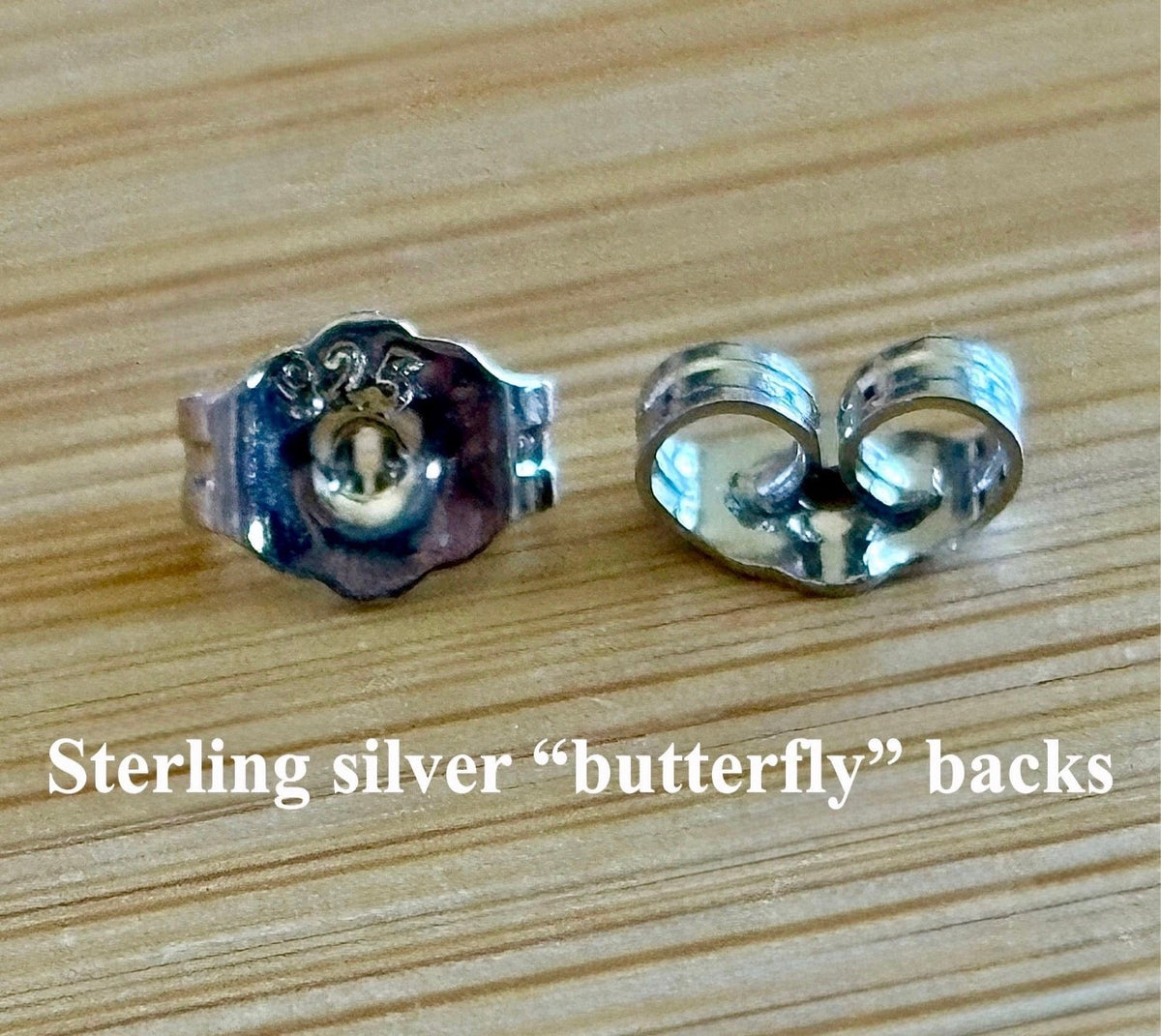 Locking earring backs (stainless steel), sterling silver replacement backs, sterling silver “UFO” security backs and silicone backs.