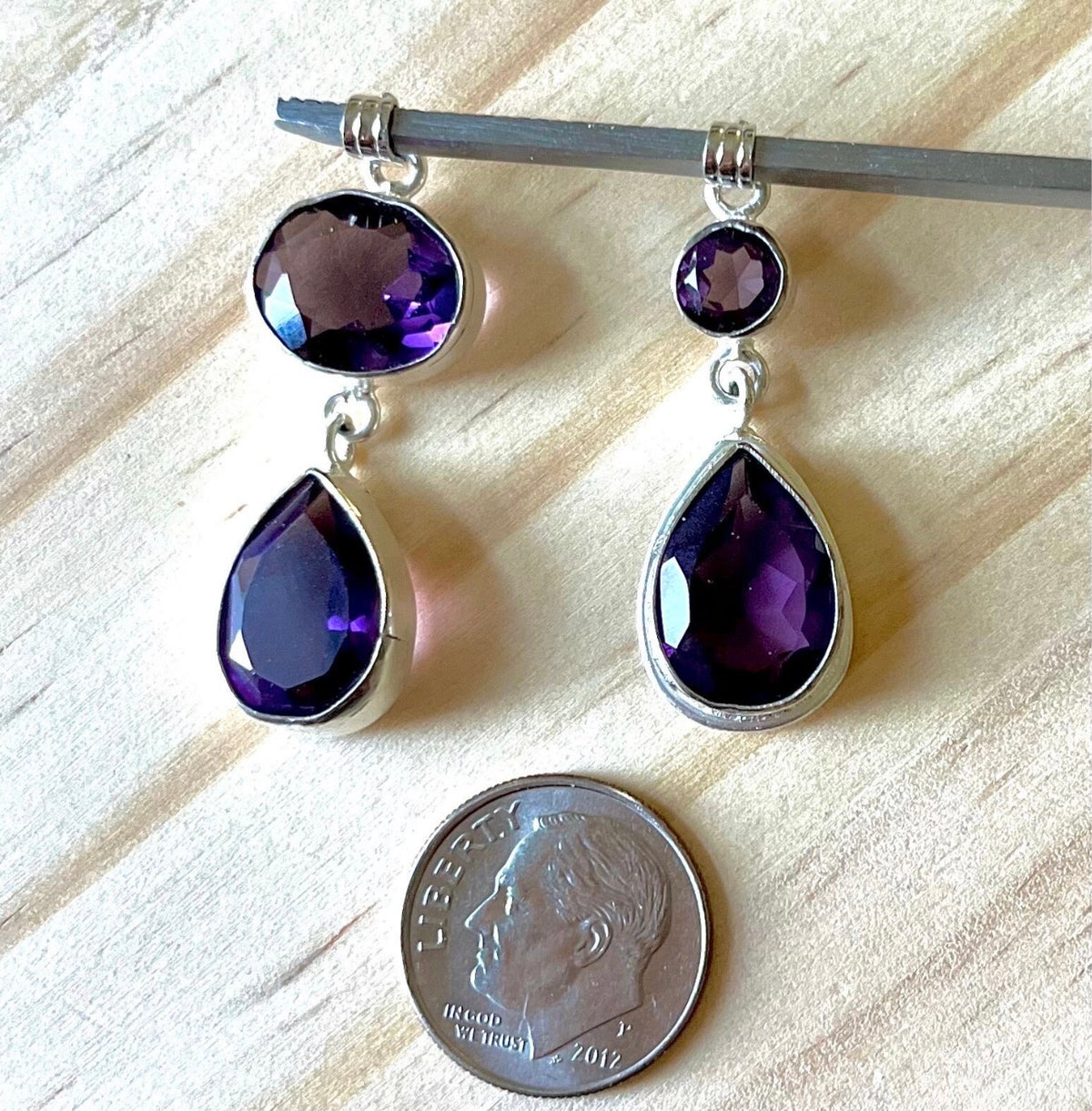 Lab tanzanite pendant and lab morganite pendants, and natural amethyst and moonstone pendants. All in solid sterling silver!